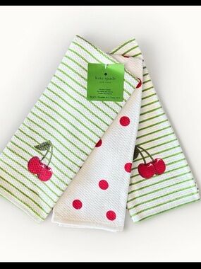 Kate Spade New York kitchen towel set featuring cherry and polka dot patterns